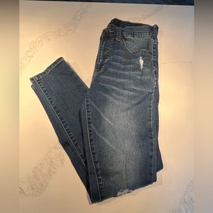 Aero high rise jeans with three rips in front. Size 4 short.